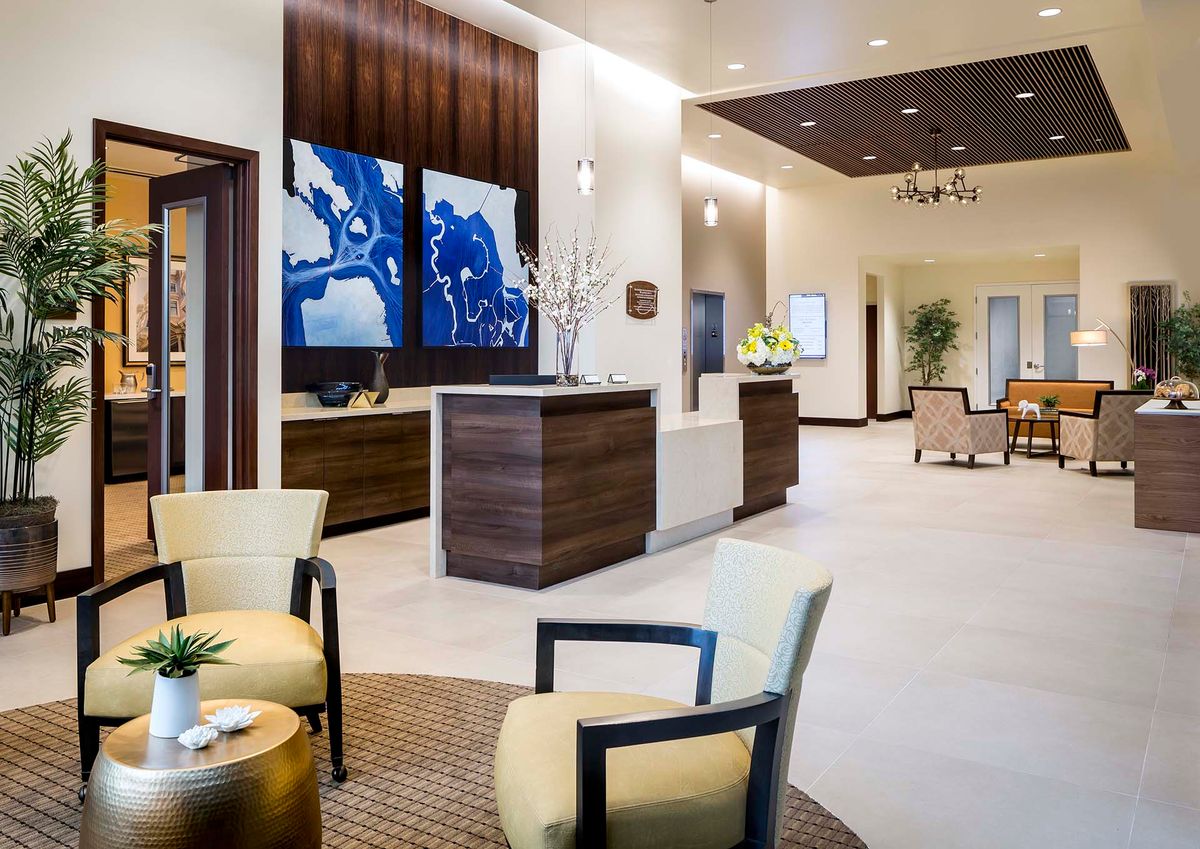A modern lobby with stylish furnishings and artwork.