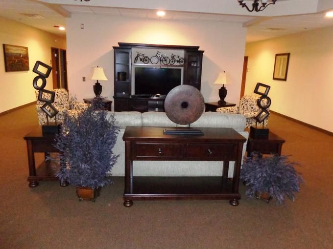 A well-decorated living room area with furniture and decorative elements.