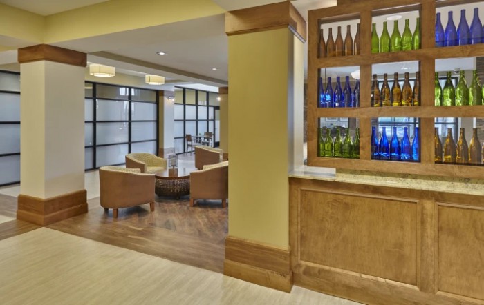 A modern lobby with a cozy seating area and stylish decor.