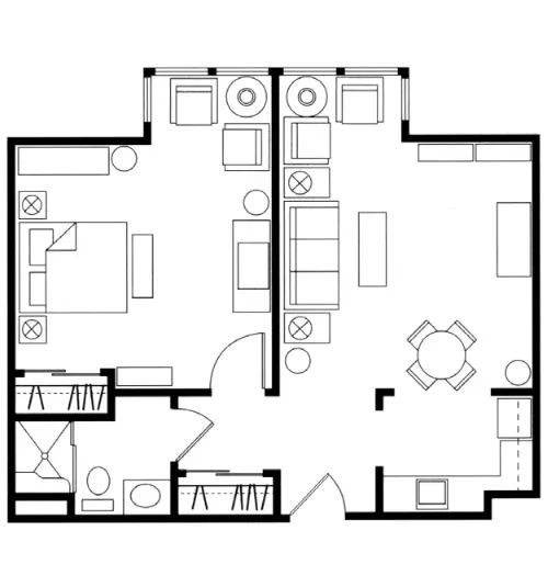 A detailed floor plan of a one-bedroom apartment, showcasing the arrangement of various rooms and furniture.