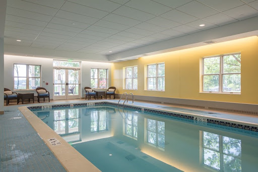 A serene indoor swimming pool area, perfect for relaxation and leisure.