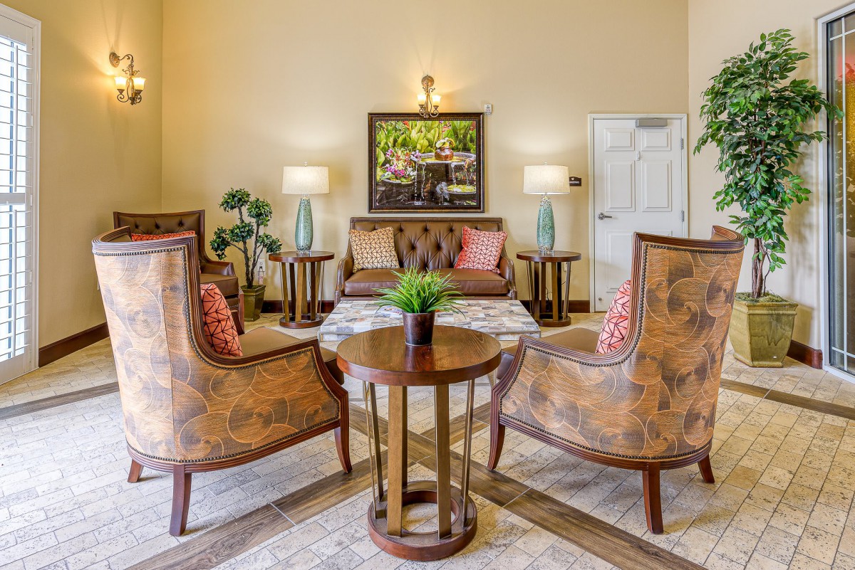 A cozy living room with elegant furniture and decor.