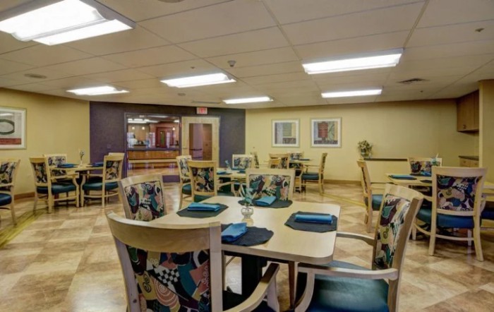 An inviting dining room with neatly arranged tables and chairs, ready for guests.