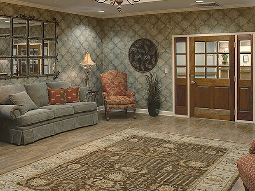 A cozy living room featuring elegant furnishings and decorative elements.