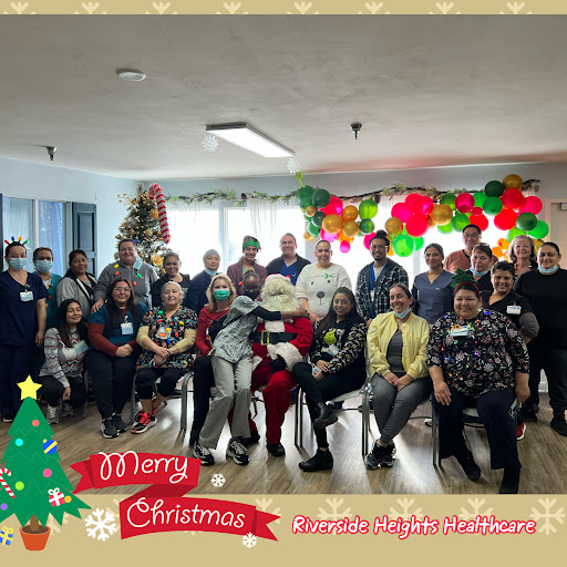 A joyful gathering celebrating the Christmas season with festive decorations and warm smiles.