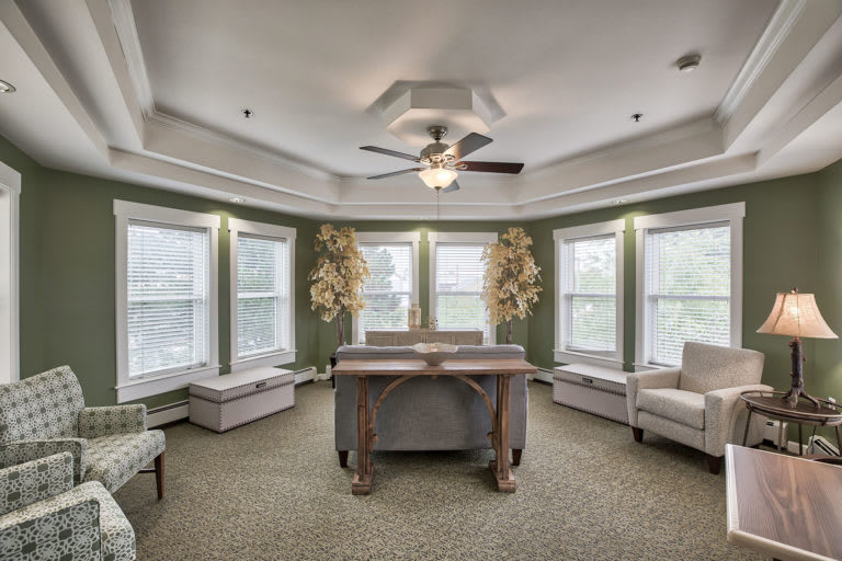 Spacious living room with elegant decor and ample natural light.