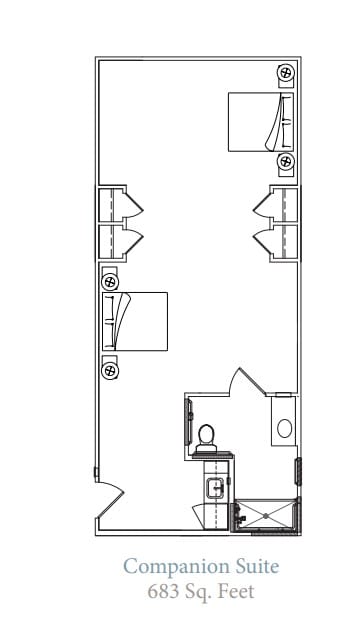 A floor plan illustrating the layout of a building interior with designated areas for restrooms and other facilities.