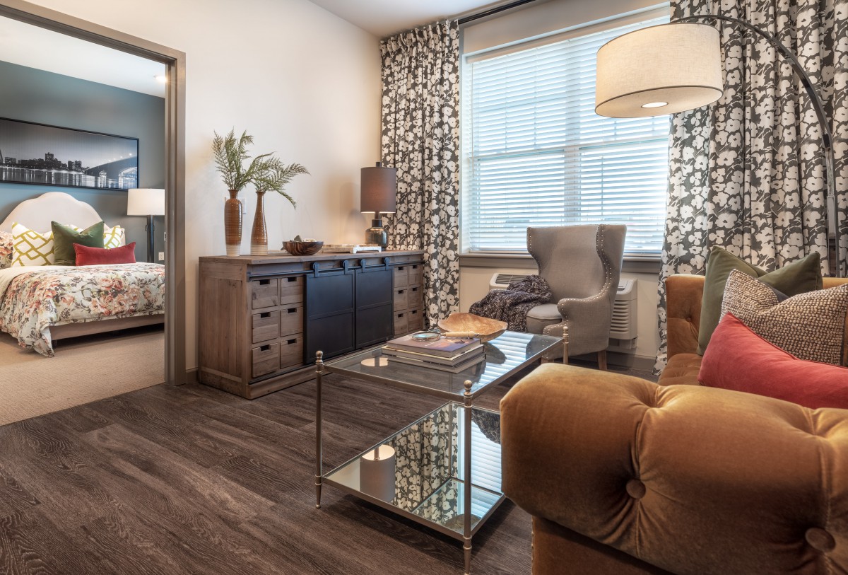 A cozy, modern living room with stylish furniture and warm decor.