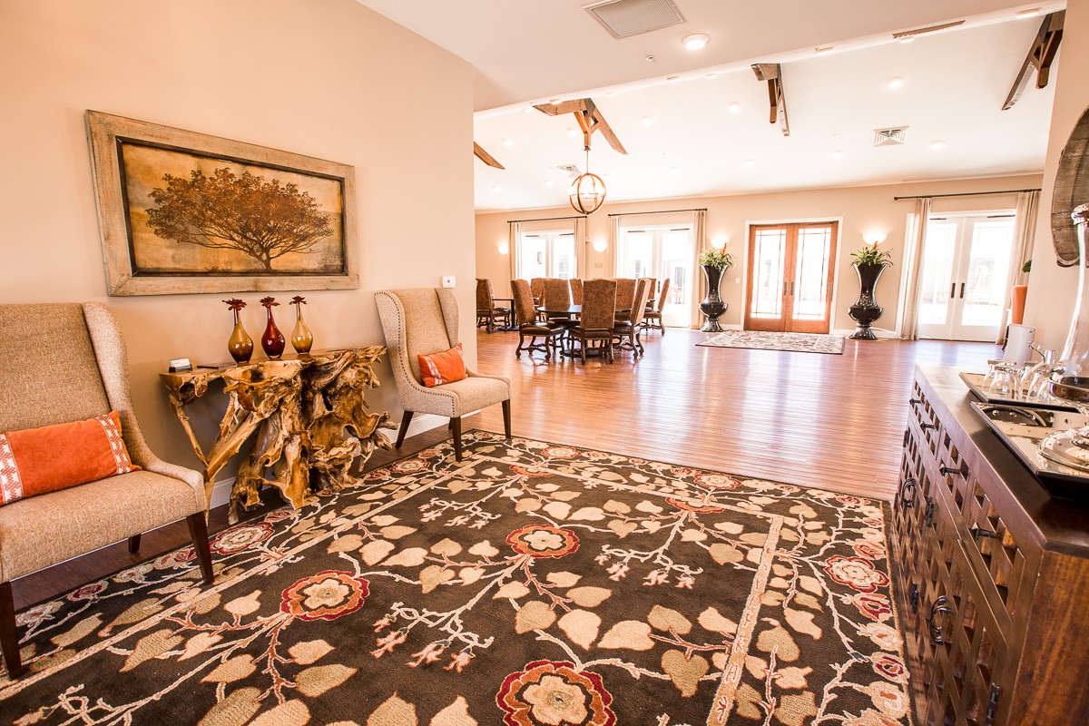 Spacious living room and dining area with elegant decor and a warm ambiance.