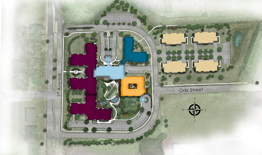 A color-coded map illustrating the layout of a building complex and surrounding landscape.