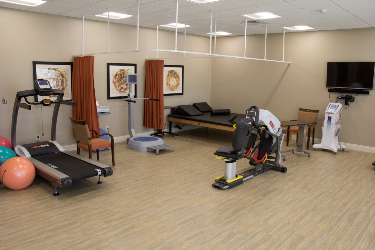 A rehabilitation center with exercise equipment and therapy spaces.