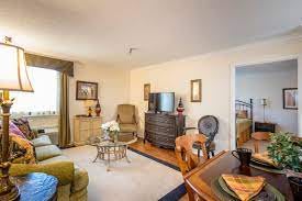 A cozy living room with comfortable seating and a TV.
