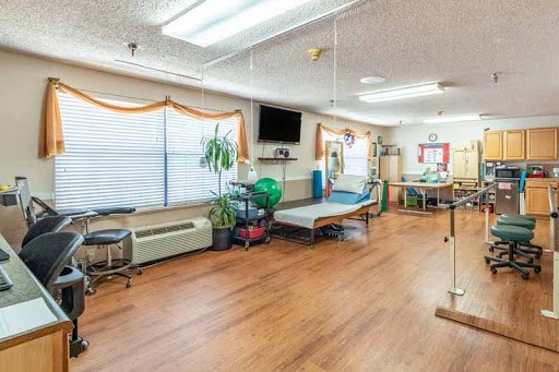 A well-lit rehabilitation therapy room designed for patient care and recovery.