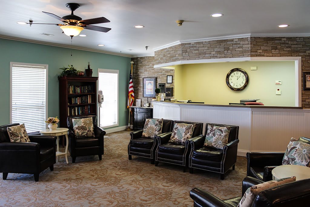 A welcoming lobby area with comfortable seating and a reception desk.