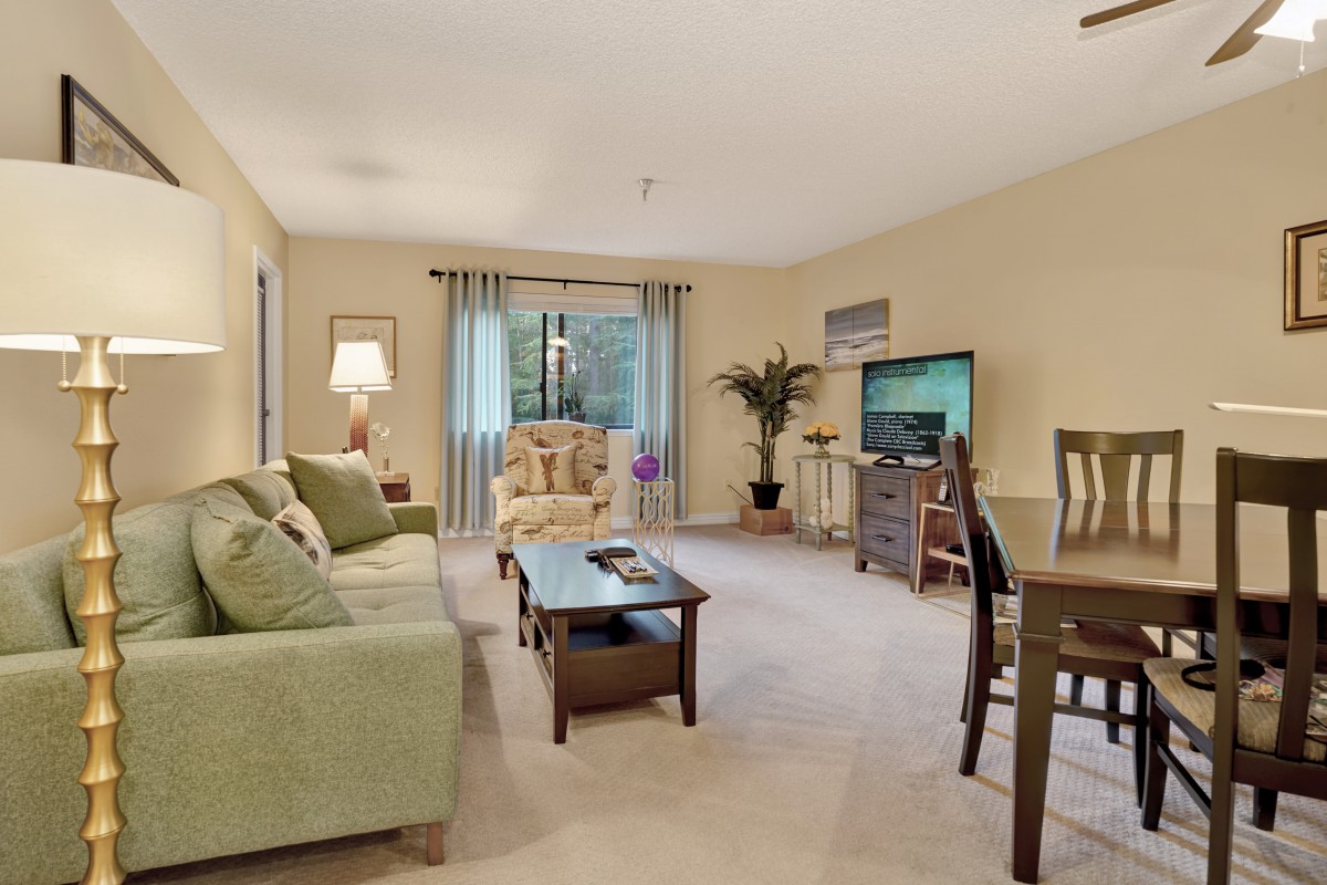 A cozy living room with comfortable furniture and a warm color scheme.