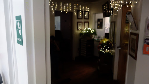 A cozy interior adorned with twinkling lights, creating a warm and inviting atmosphere.