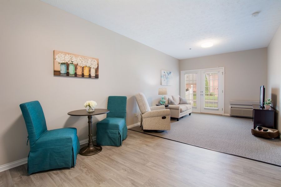 A modern and cozy living room with comfortable seating and stylish decor.