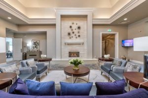 A modern lobby with elegant furniture and stylish decor.
