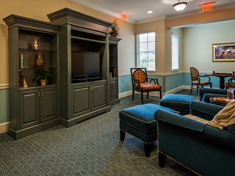 A cozy living room with comfortable seating and a television.