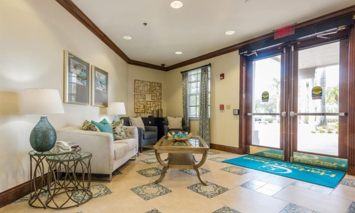 A cozy and modern lobby area with comfortable seating and tasteful decor.