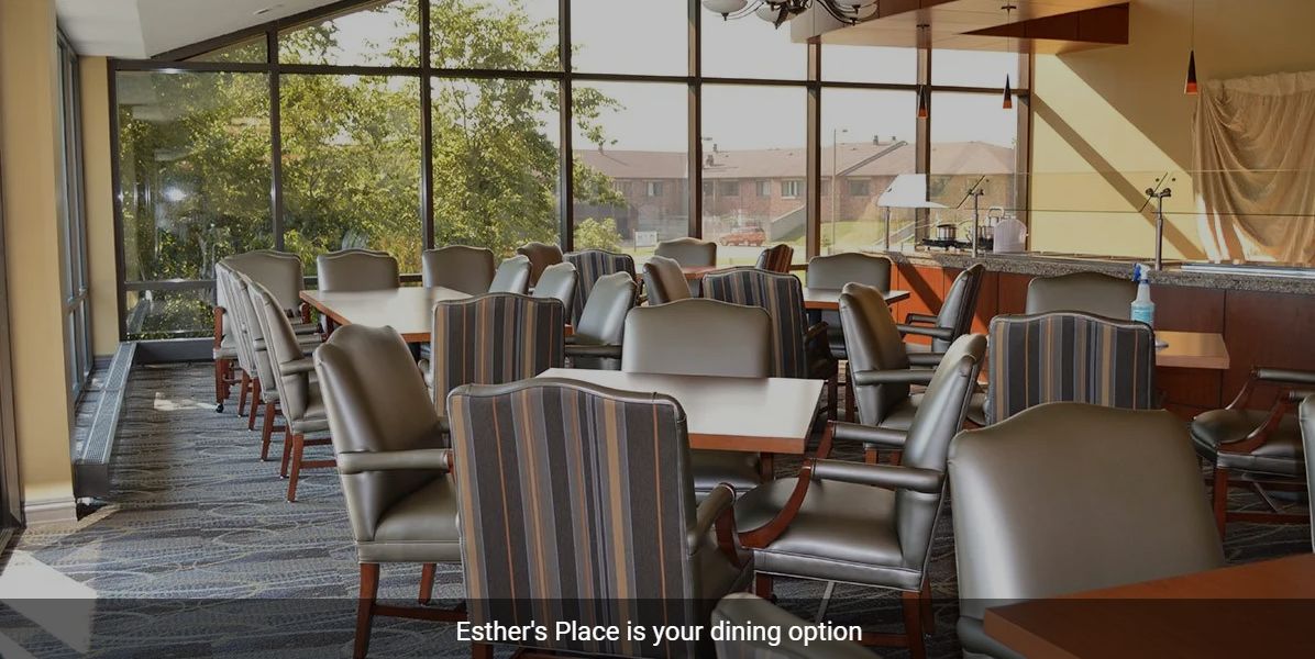 An elegant dining space with a view at Esther's Place.