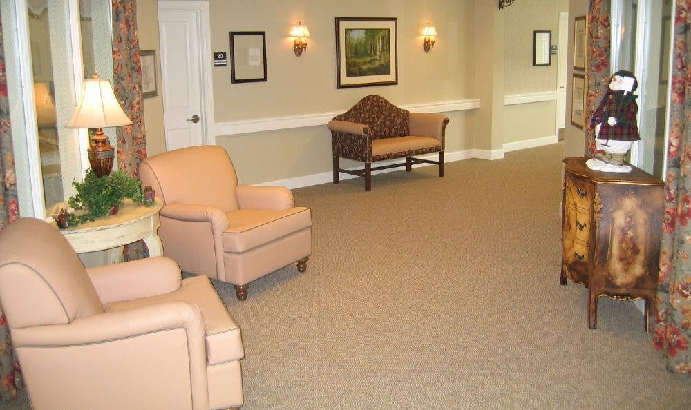 A cozy lobby with comfortable seating and warm lighting.