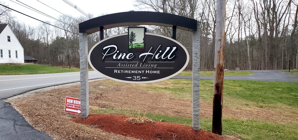 Sign for Pine Hill Assisted Living Retirement Home.