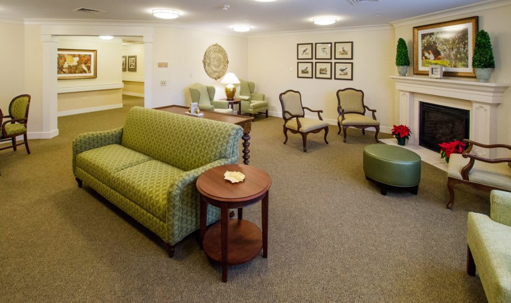 A cozy living room with comfortable seating and elegant decor.