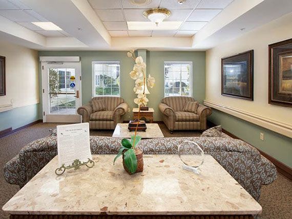 A cozy lobby area with comfortable seating and decorative elements.