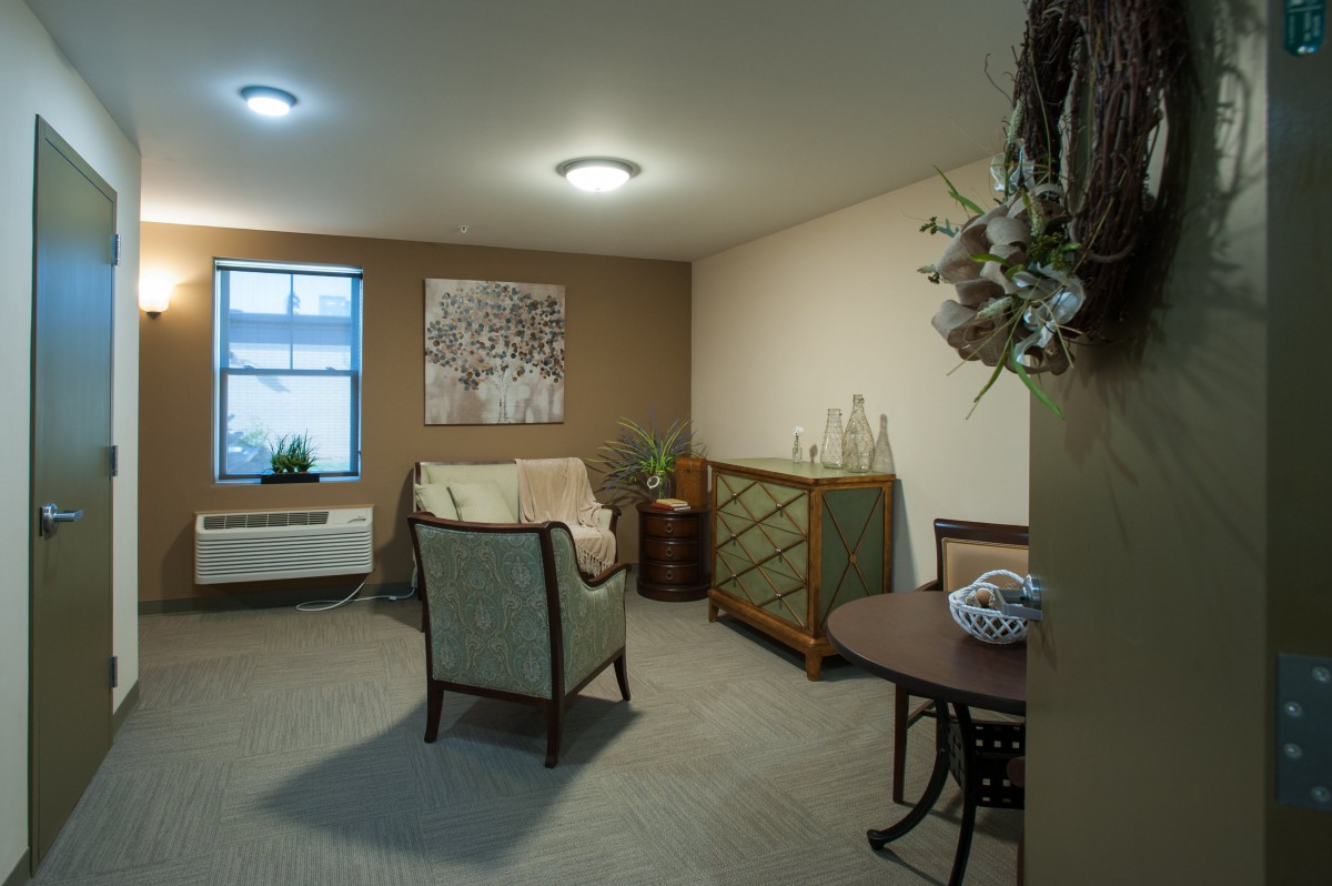 Cozy living room with comfortable seating and elegant decor.