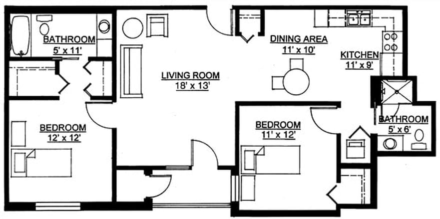 A blueprint of an apartment showing a living room, bedroom, and dining area.