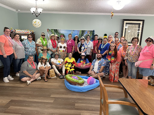 A vibrant gathering of friends enjoying a tropical-themed party!