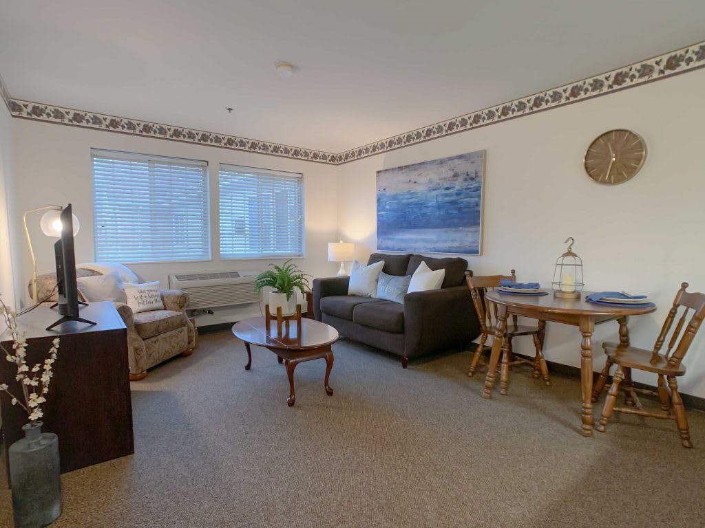 A cozy living room with comfortable seating and tasteful decor.