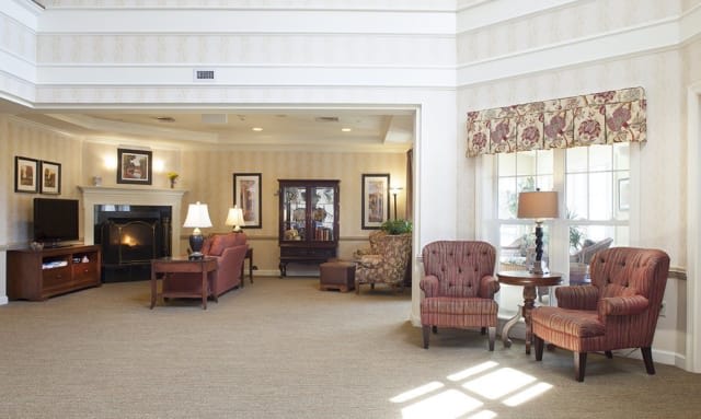 A spacious lobby area featuring traditional furniture and elegant decor.