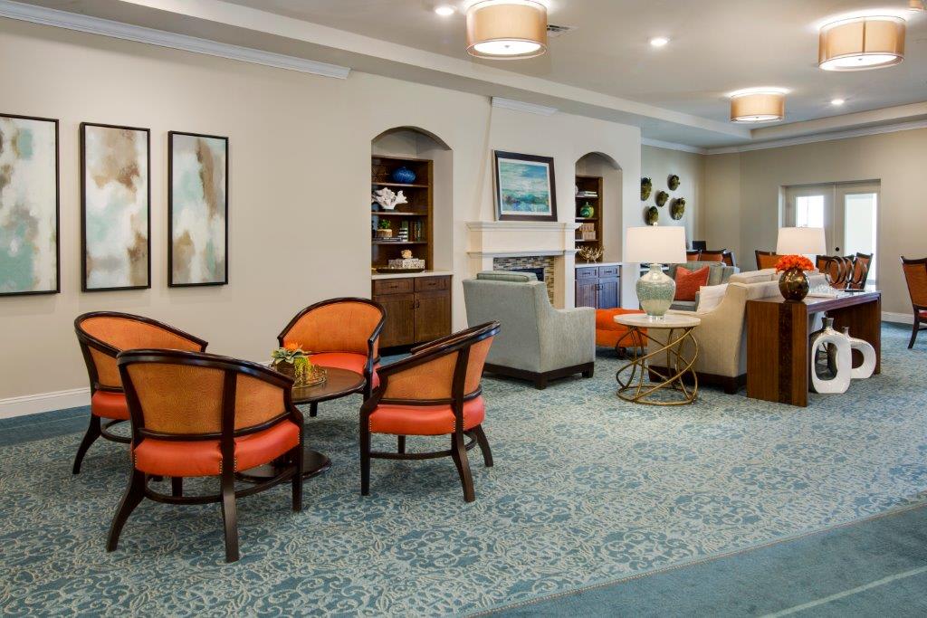 A well-furnished lobby with comfortable seating and tasteful decor.