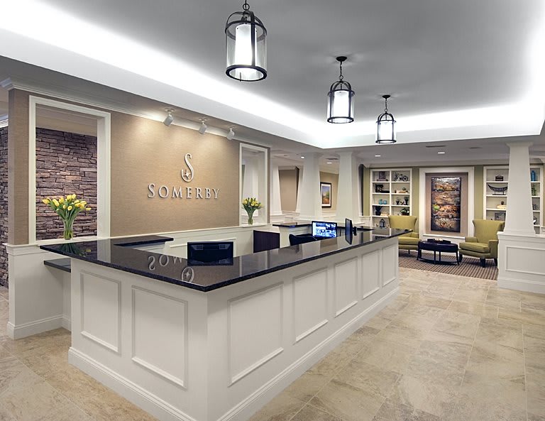 A modern reception area with sleek design and comfortable seating.