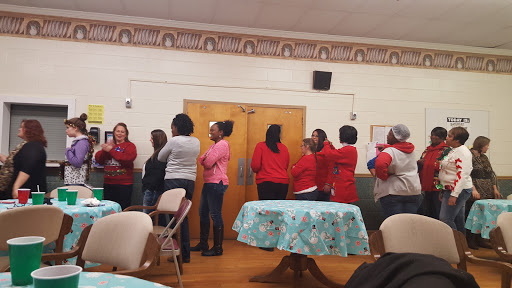 A community gathering where participants are engaged in a group activity.
