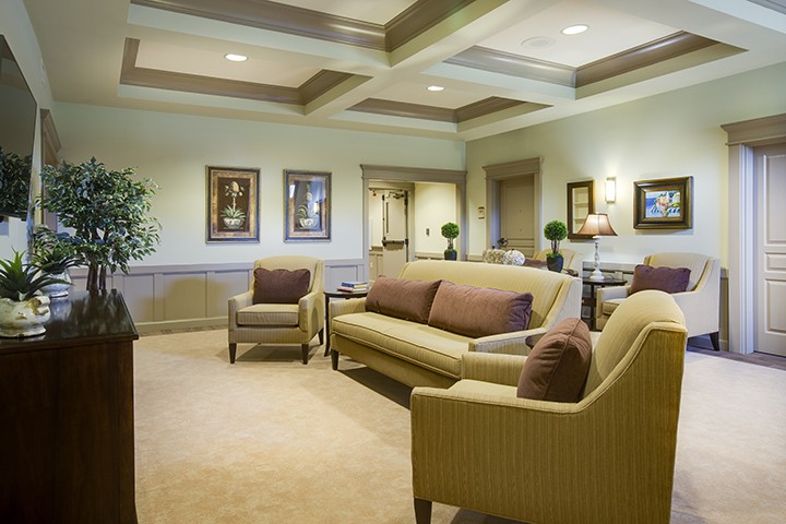 A cozy and elegantly designed living room with comfortable seating and tasteful decor.