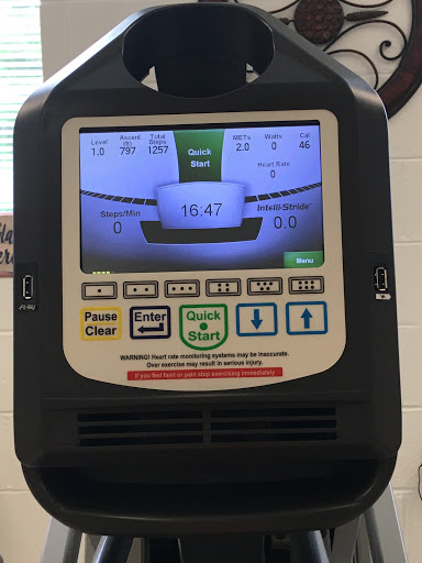 A close-up view of a fitness machine's display panel, indicating various workout metrics.