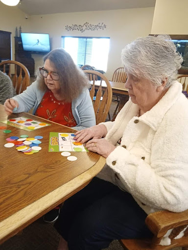 Residents enjoying a friendly game of bingo together.