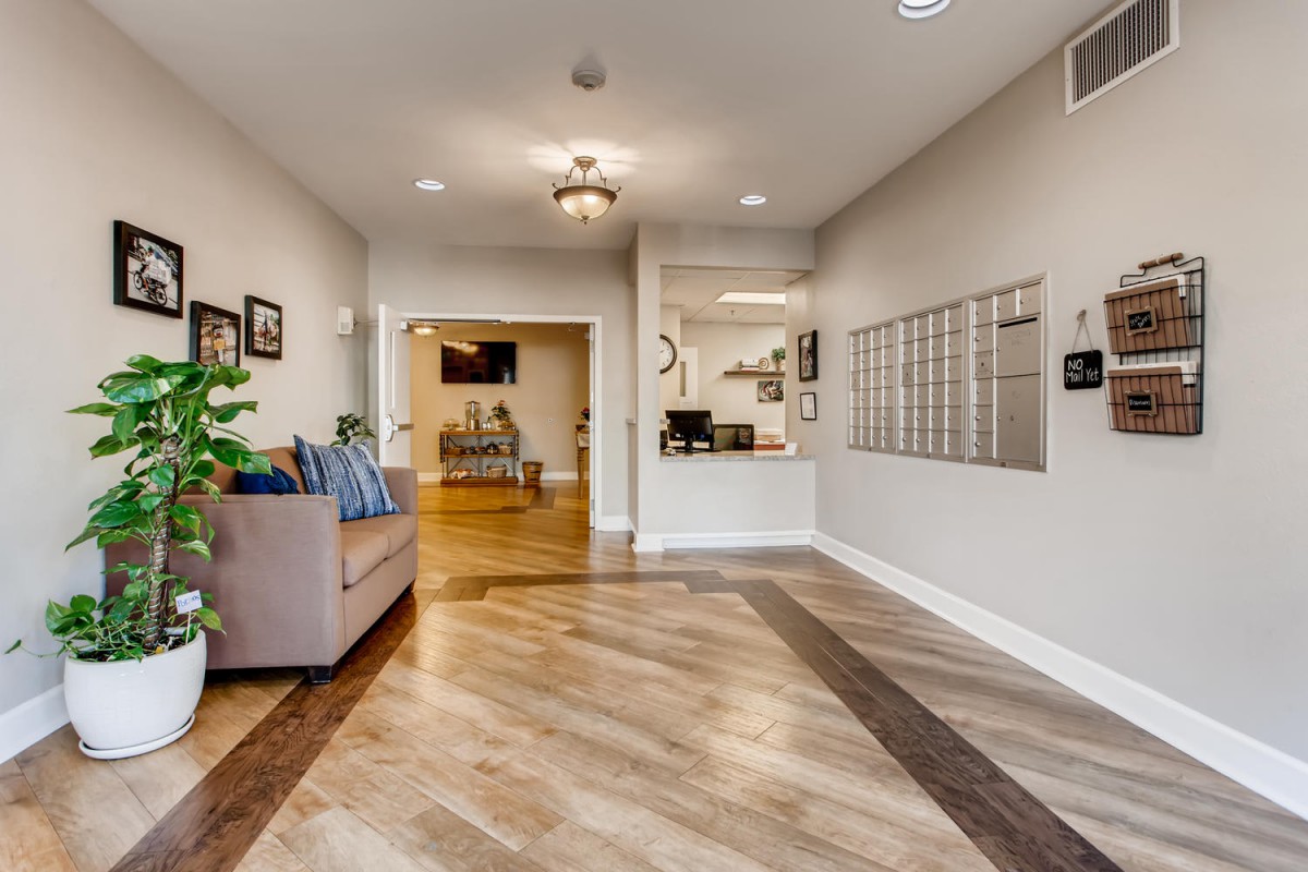 A well-lit lobby with a comfortable seating area and modern decor.