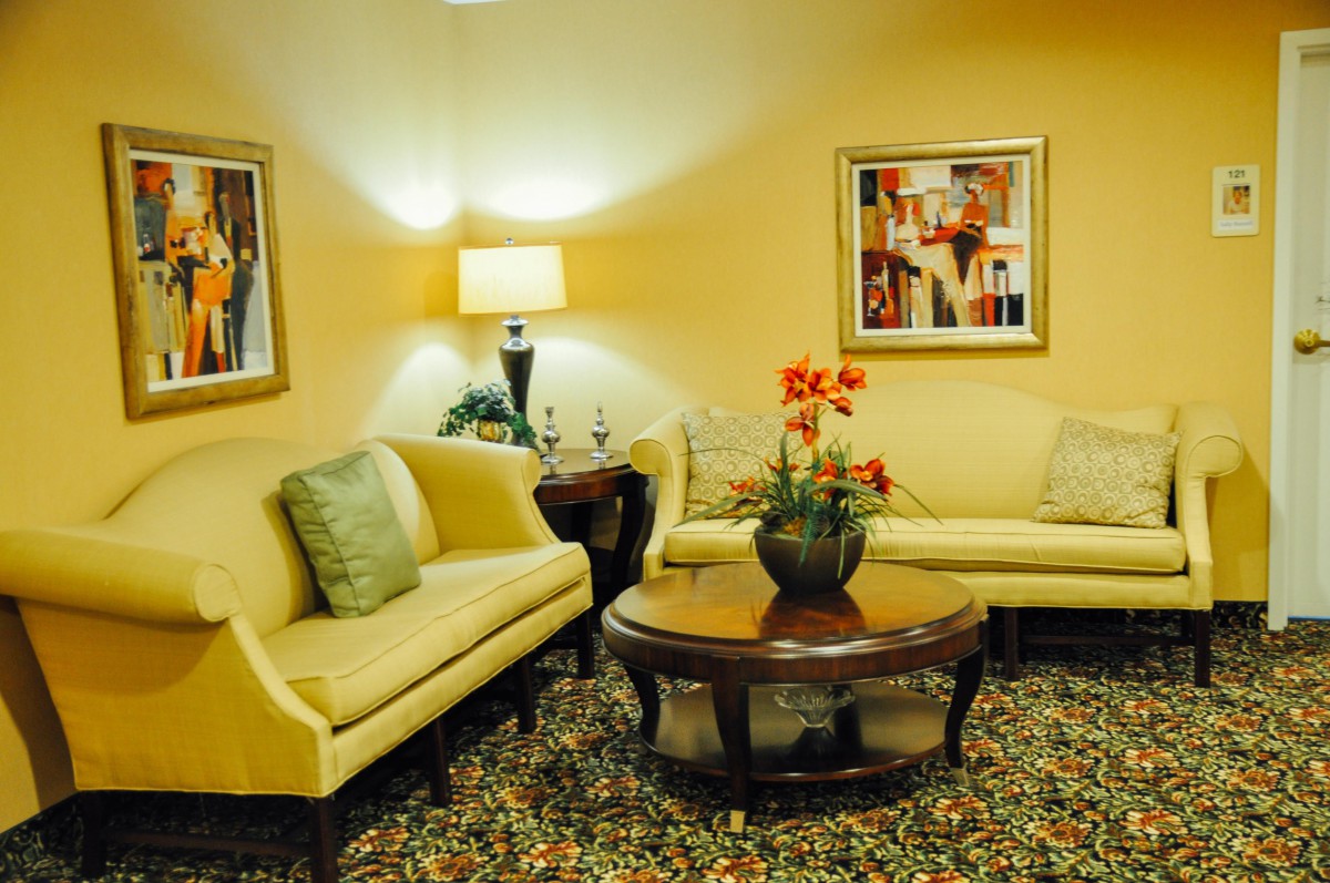 A cozy living room with comfortable seating and stylish decor.