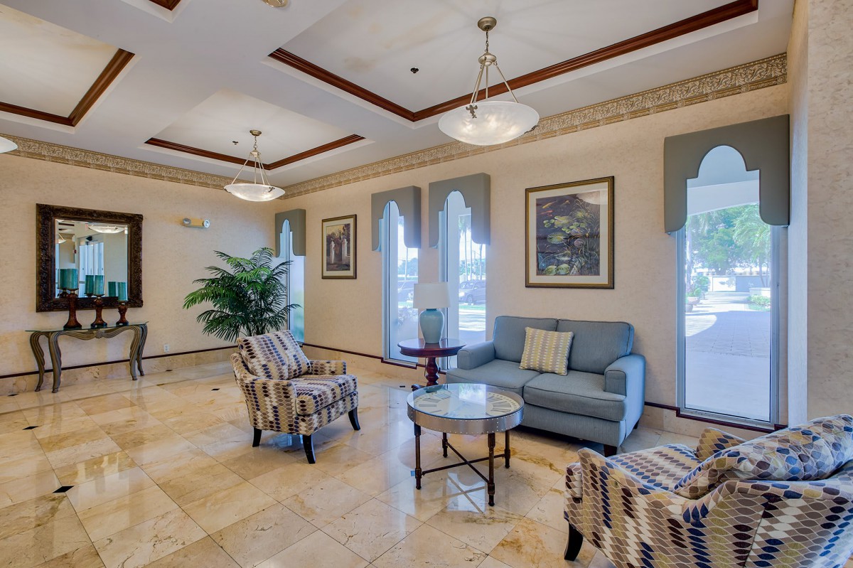 Elegant living room with cozy seating and decorative elements.