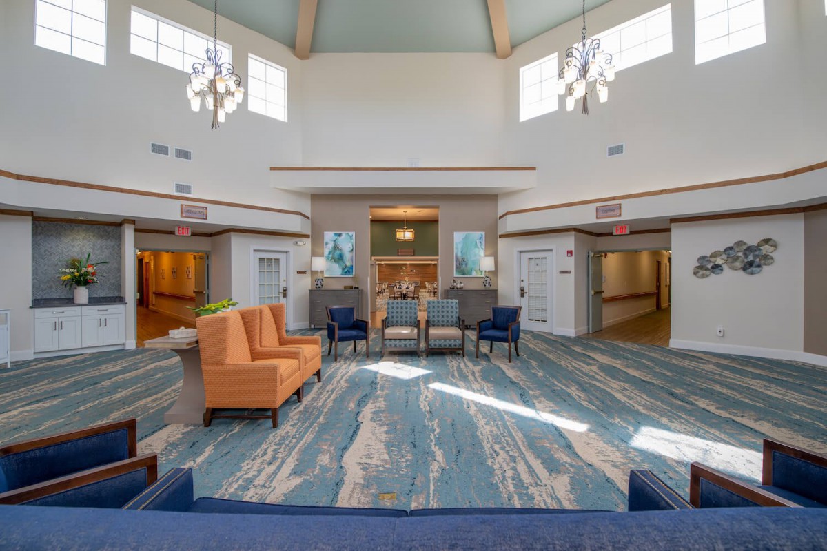 A spacious and modern lobby with comfortable seating and elegant lighting.