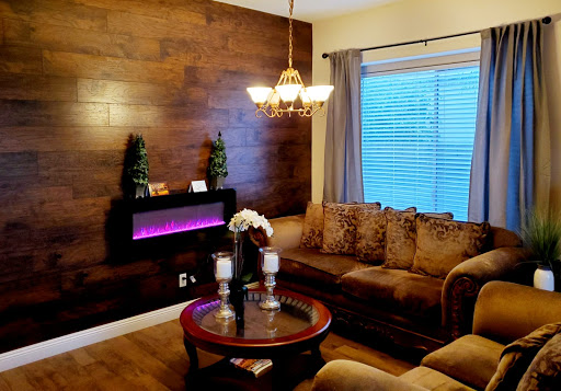 A beautifully designed living room featuring warm wood accents and cozy seating.
