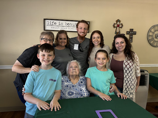 A heartwarming family gathering with loved ones sharing smiles and memories.