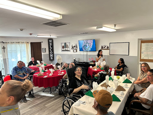 Seniors enjoying a community dining event, complete with festive table settings and engaging activities.
