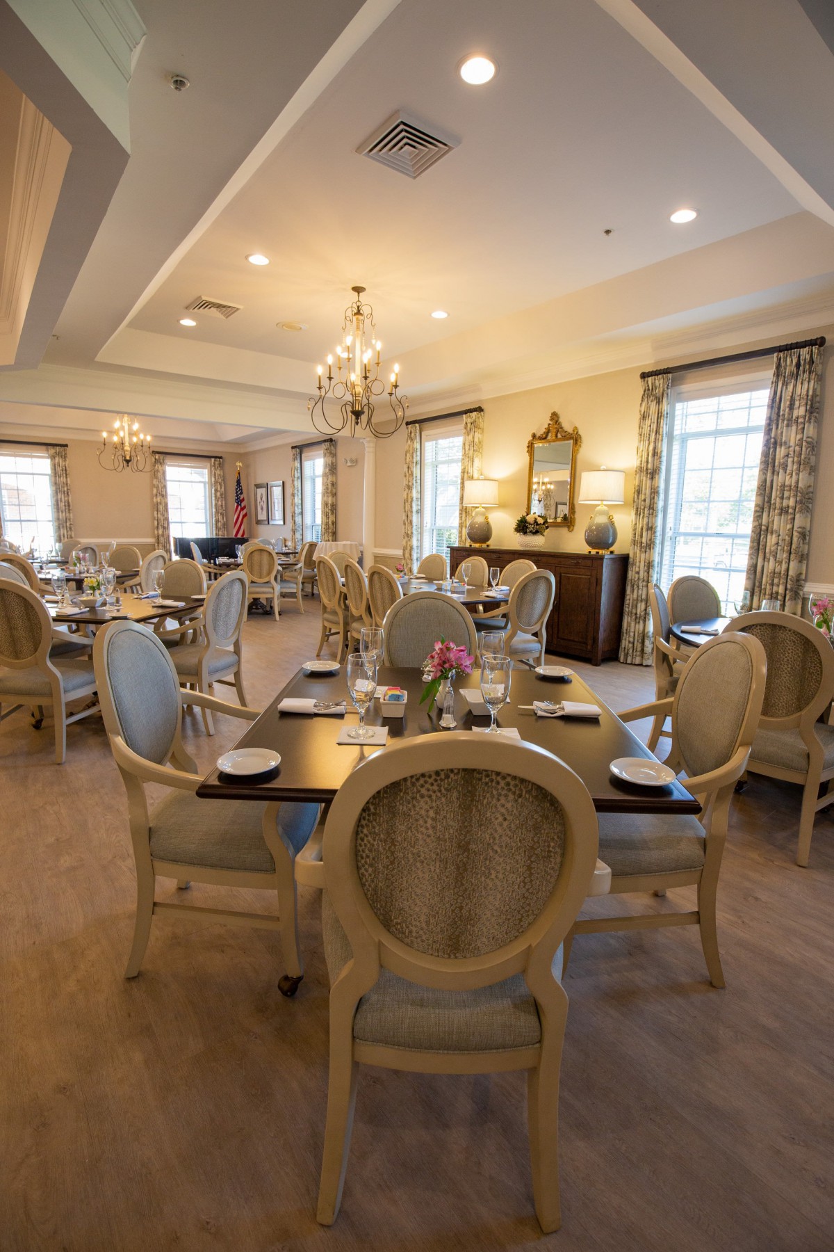 An elegant dining room with stylish seating and decor.