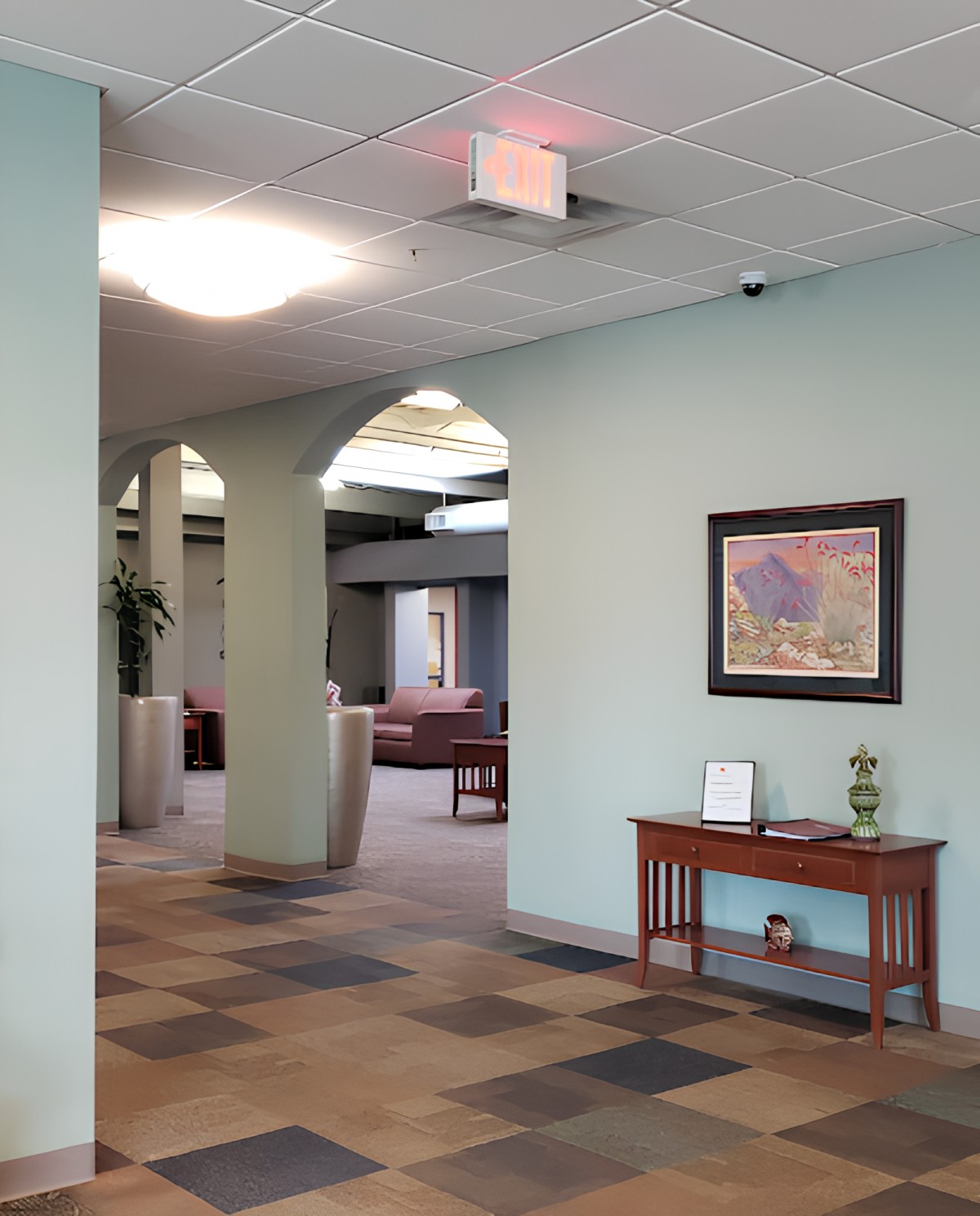 A view of a lobby area featuring seating and wall artwork.