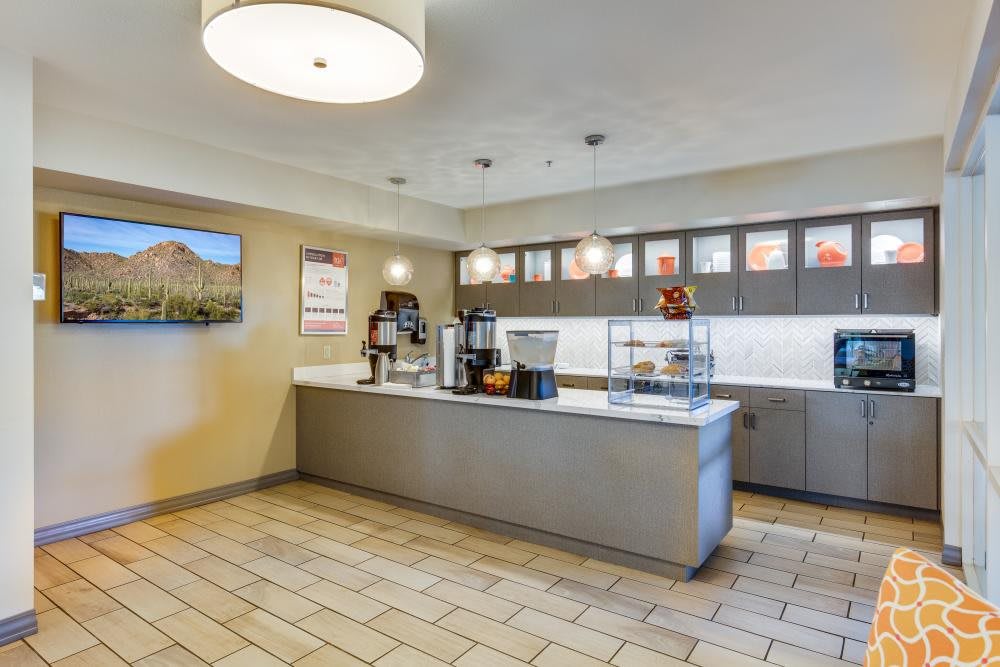 A modern self-service coffee station in a hospitality setting.